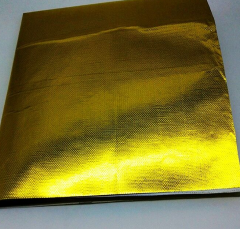 Golden reflective heat shield with adhesive back