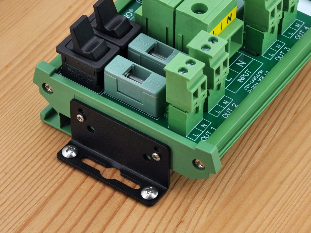 AC 52 Amp 4 Channel Power Distribution Module, Paddle Switch, Fused, Pluggable Side Wiring Terminal Block, DIN Rail and Screw Mount