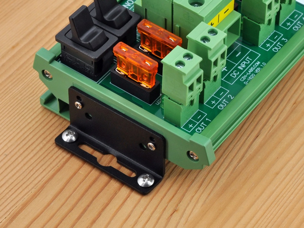 DC 52 Amp 4 Channel Power Distribution Module, Paddle Switch, Fused, Pluggable Side Wiring Terminal Block, DIN Rail and Screw Mount