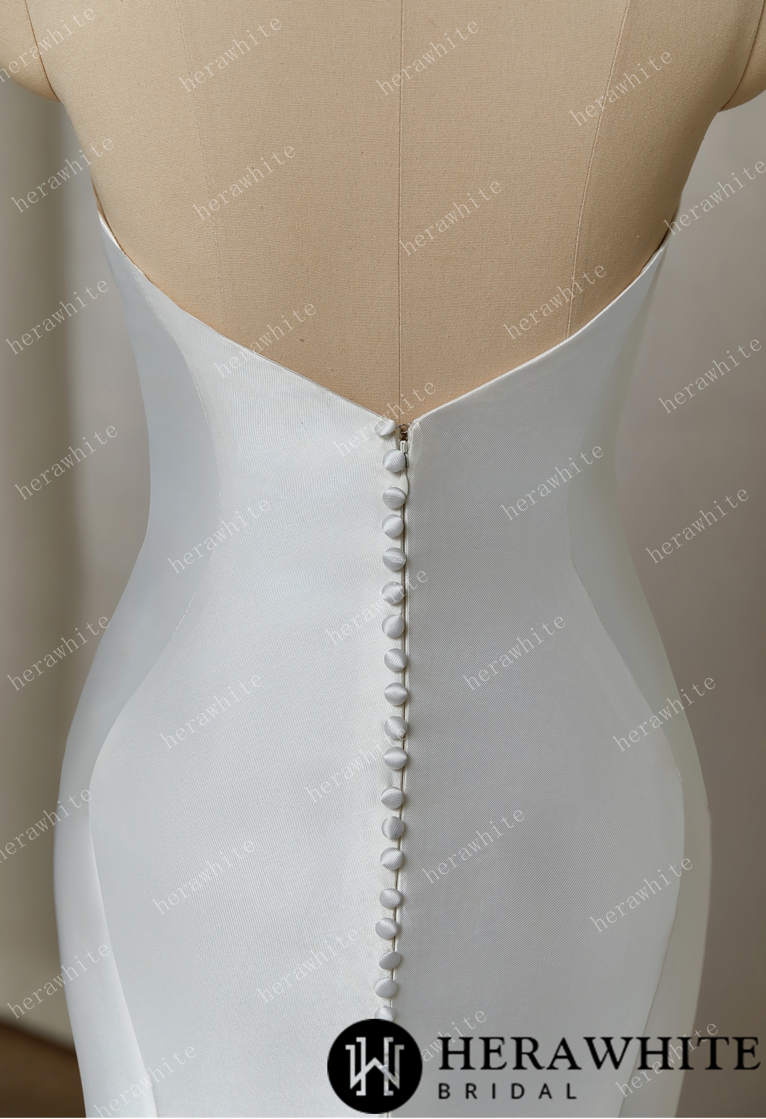 Classic Silhouette: Strapless Mermaid Gown with Button-Adorned Back