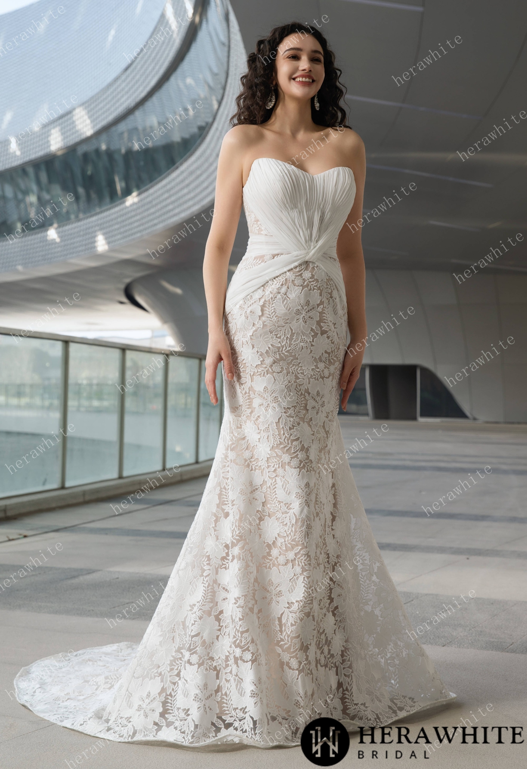 Elegant Strapless Pleated Wedding Dress with Lace Mermaid Skirt and Flowing Sheer Cape