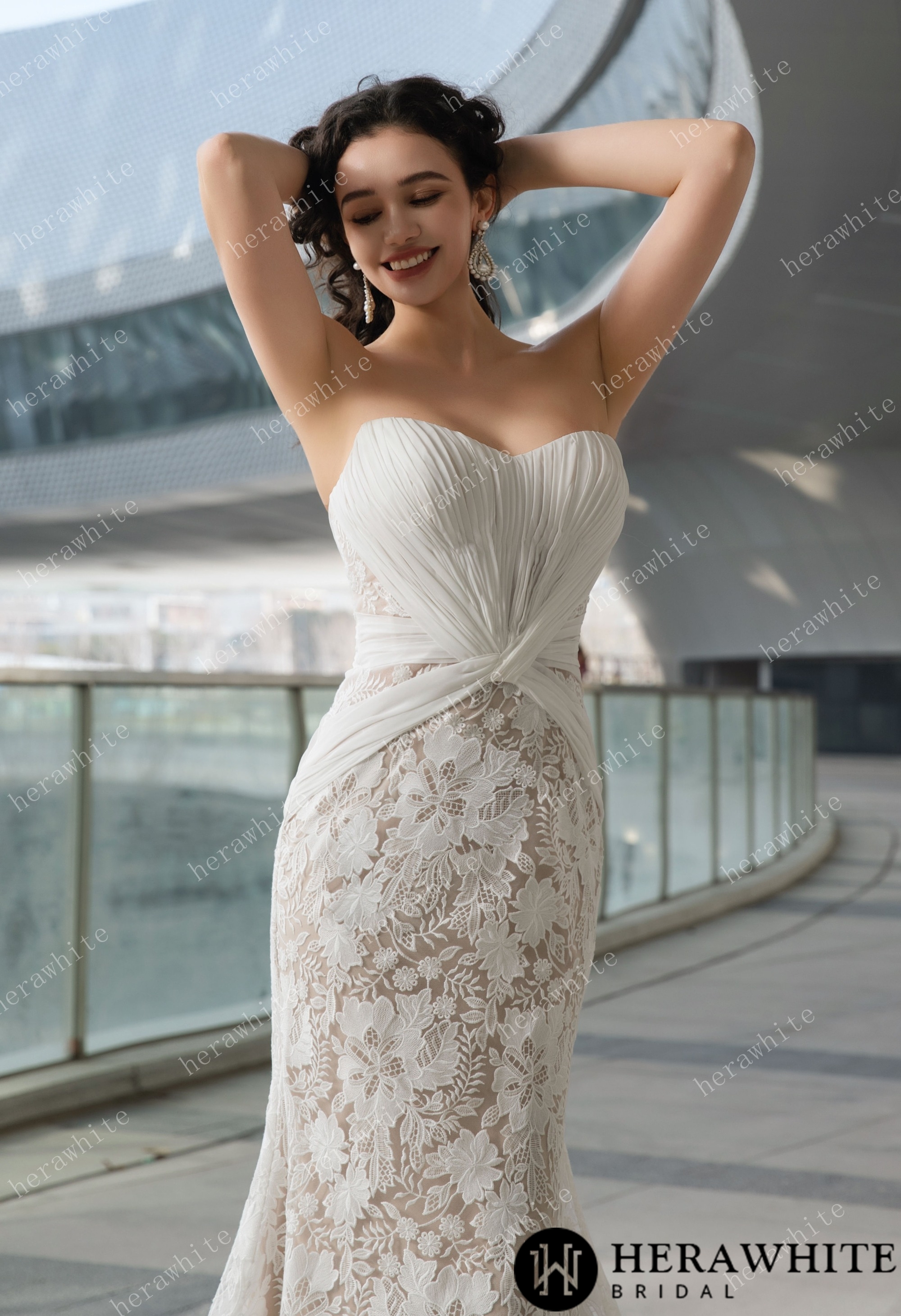Elegant Strapless Pleated Wedding Dress with Lace Mermaid Skirt and Flowing Sheer Cape