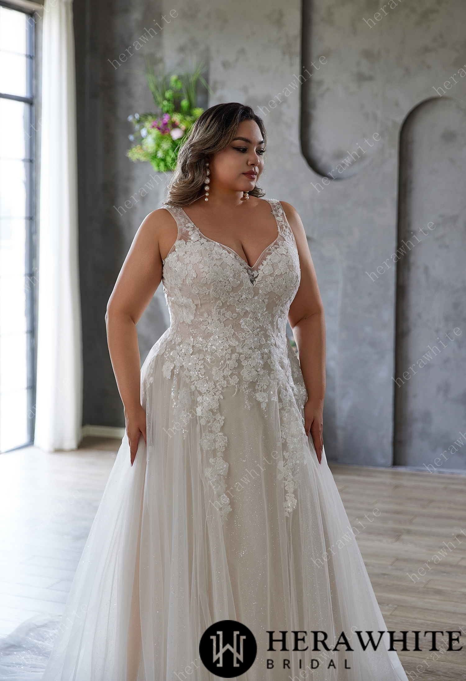 Elegant and Ethereal Plus-Size Wedding Dress with Lace and Sequins