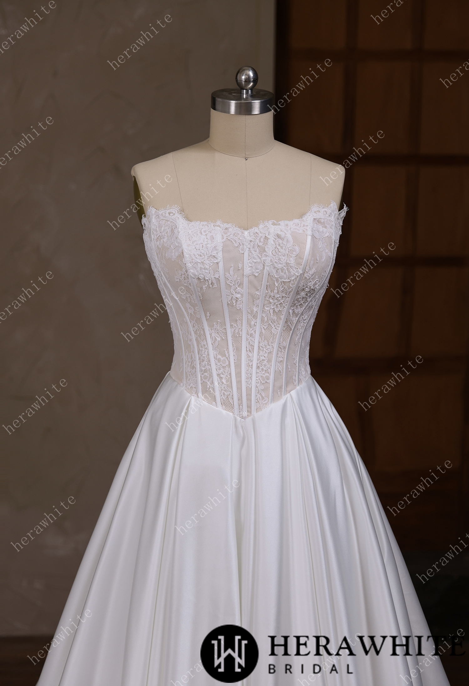 Irregular neckline with a Basque waistline wedding gown