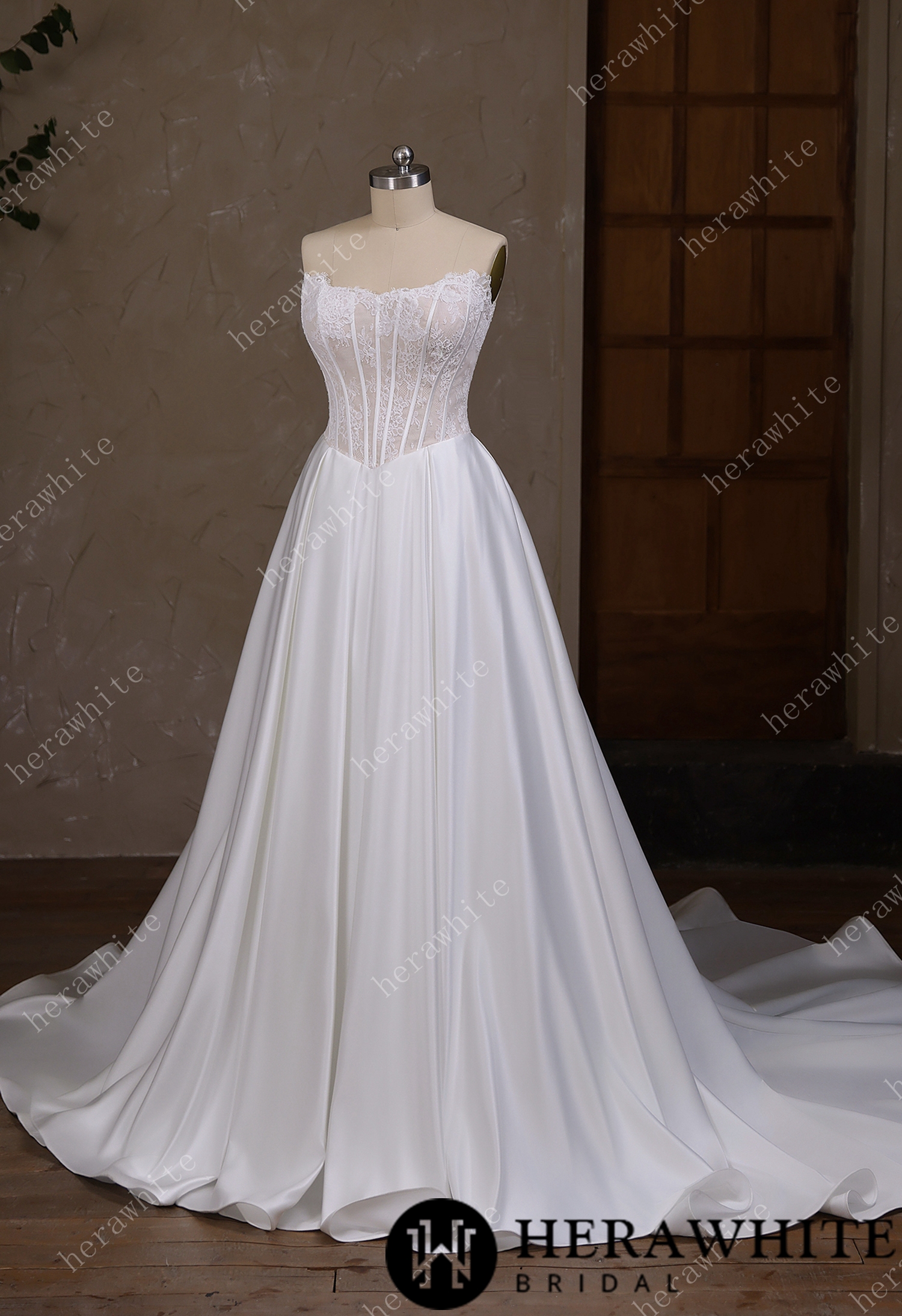 Irregular neckline with a Basque waistline wedding gown