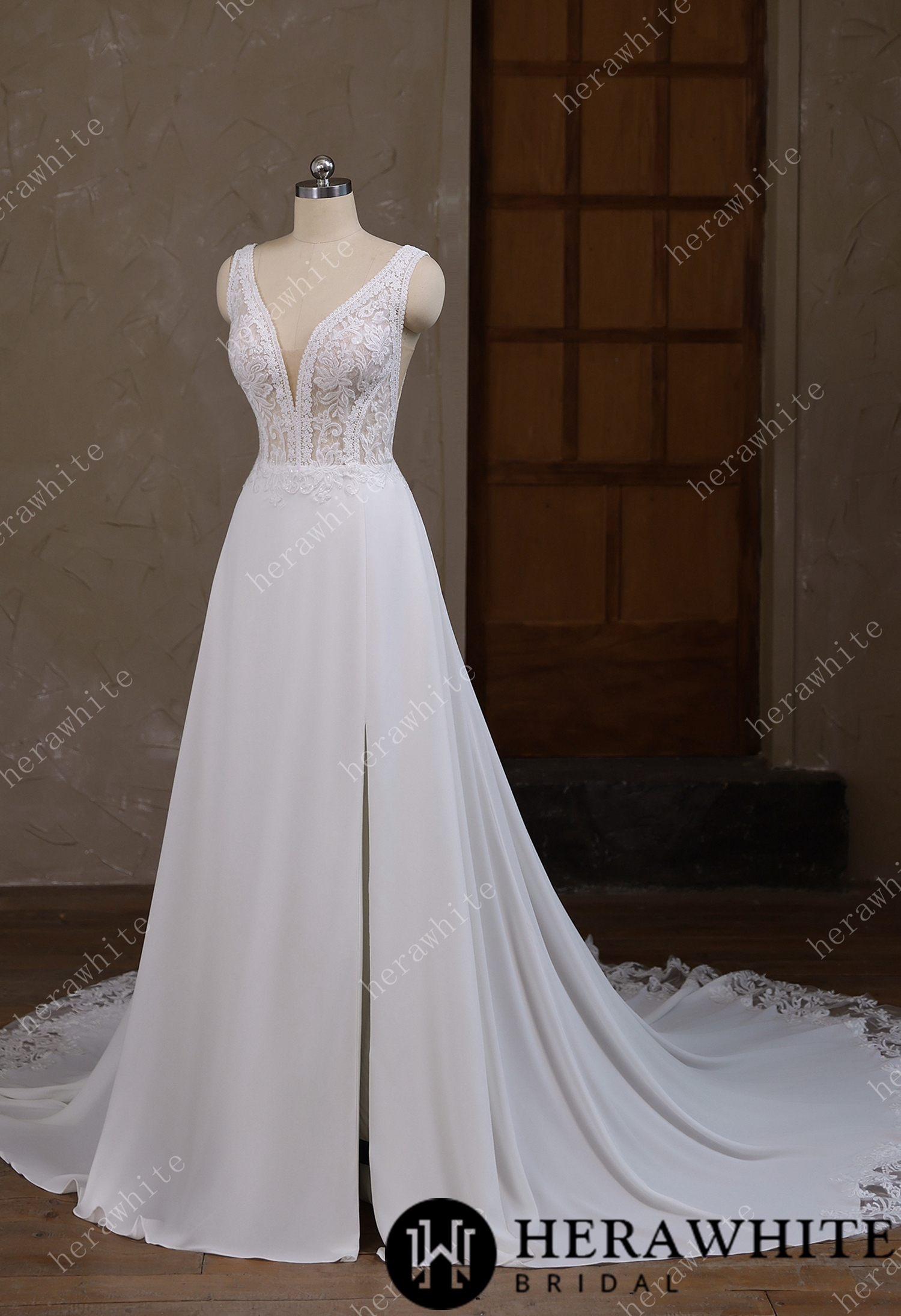 Deep V-neck and sleeveless design with symmetrical lace wedding gown