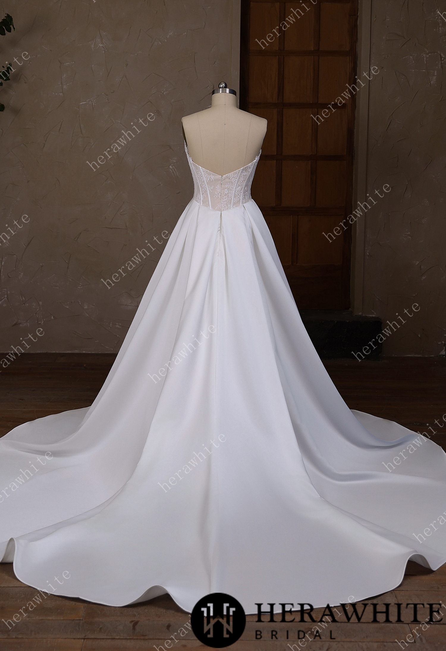 Irregular neckline with a Basque waistline wedding gown