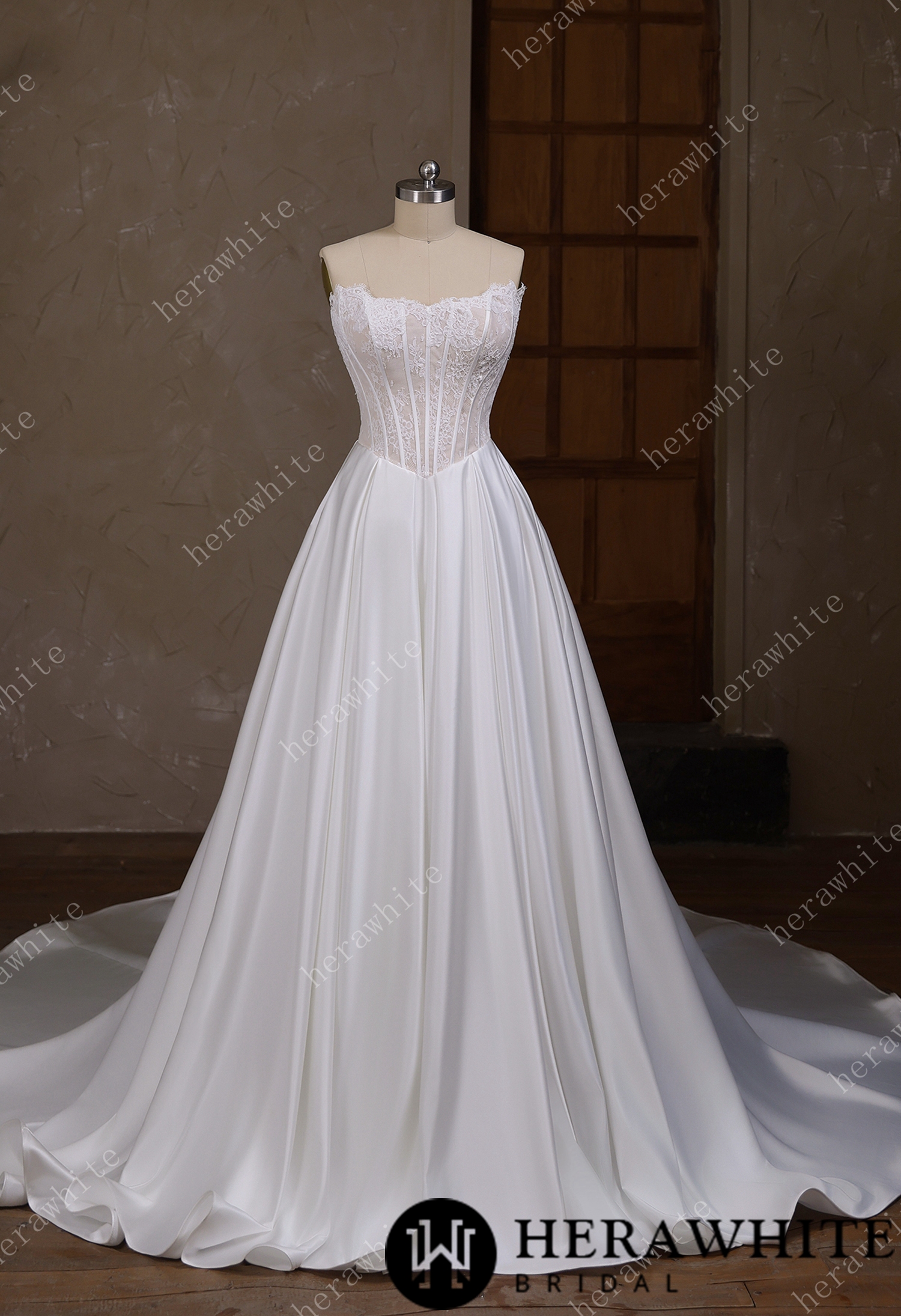 Irregular neckline with a Basque waistline wedding gown