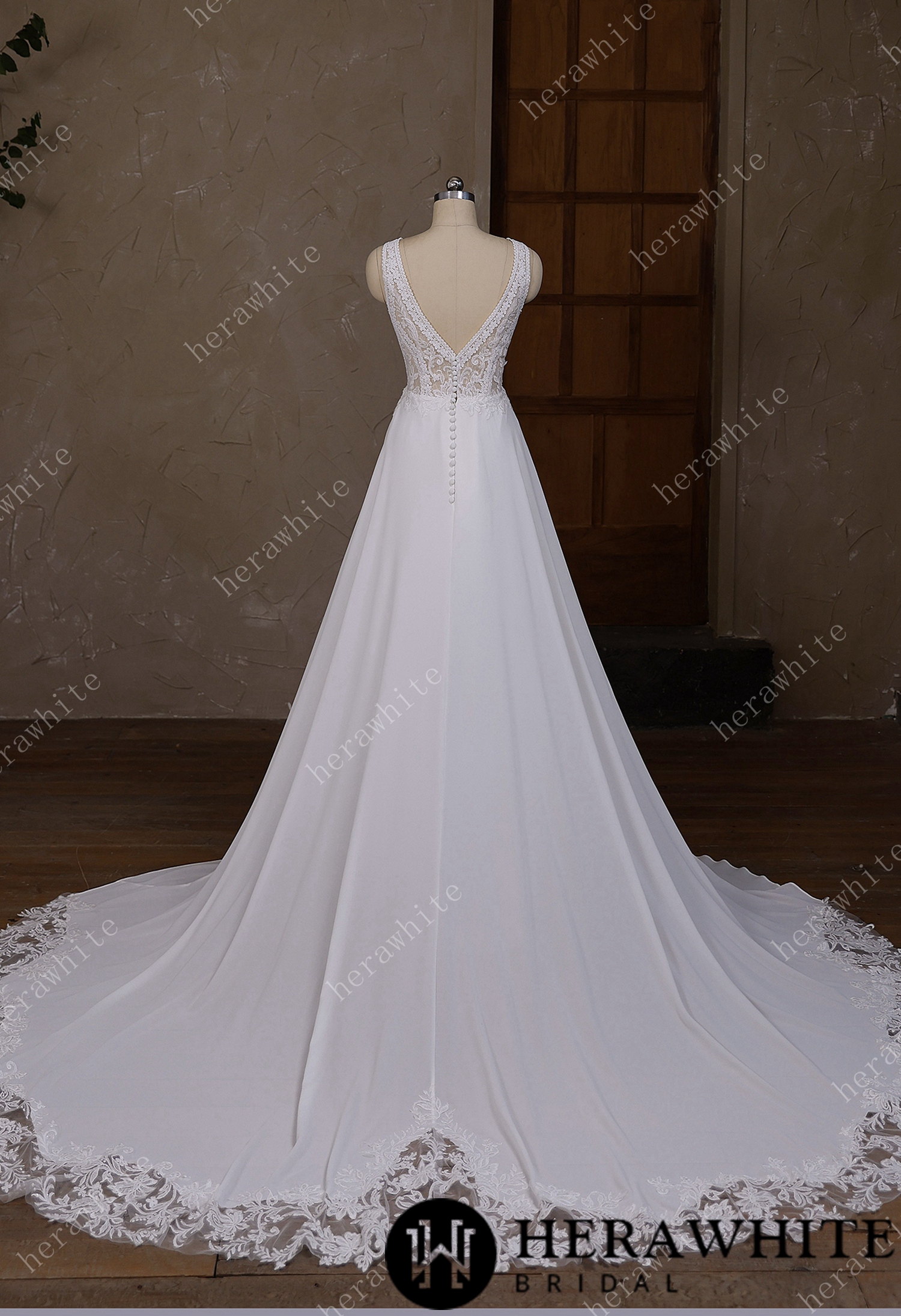 In Stock/ Deep V-neck and sleeveless design with symmetrical lace wedding gown