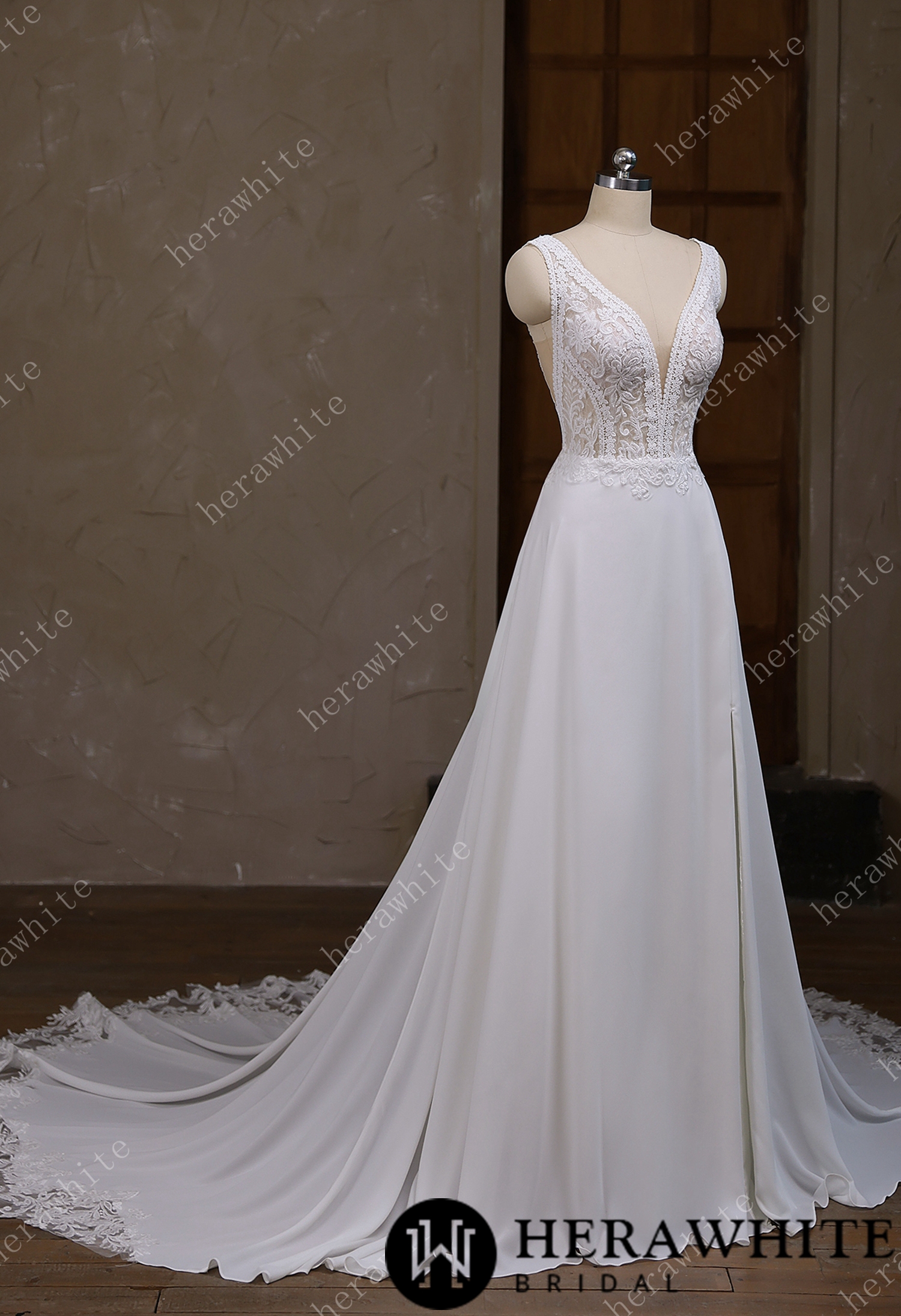 In Stock/ Deep V-neck and sleeveless design with symmetrical lace wedding gown