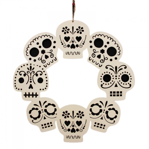 Wooden skull and snake wall decoration