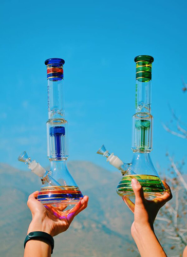 customers holding phoenix star bongs