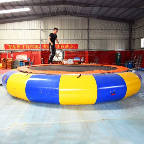 cheap inflatable floating water trampoline with slide