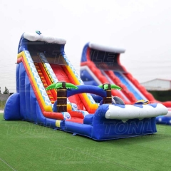 red inflatable water slide with pool