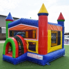 Classic red, yellow and blue castle-style inflatable bounce house for sale