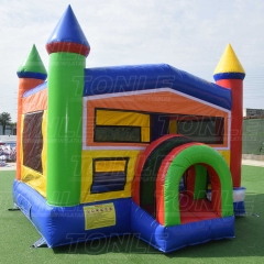 Classic red, yellow and blue castle-style inflatable bounce house for sale