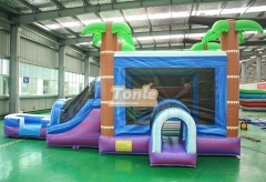 Blue colorful palm tree water slide bounce house combination