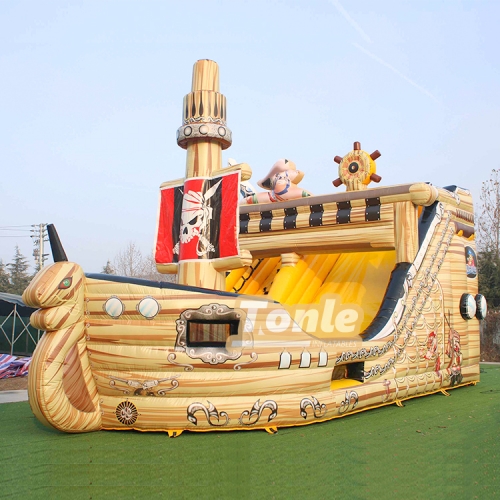 Vendor sells pirate ship themed inflatable slides