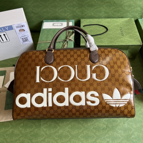 No.53877   702422    47*29*23cm  Adidasx Gucci co branded series, large travel bag, PVC crystal material