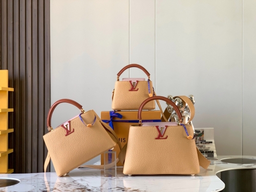 No.54214   M59465  27*18*9cm   M59466  31.5*20*11cm   Capucines handbag, grain cow leather, apricot yellow with light earth gold buckle