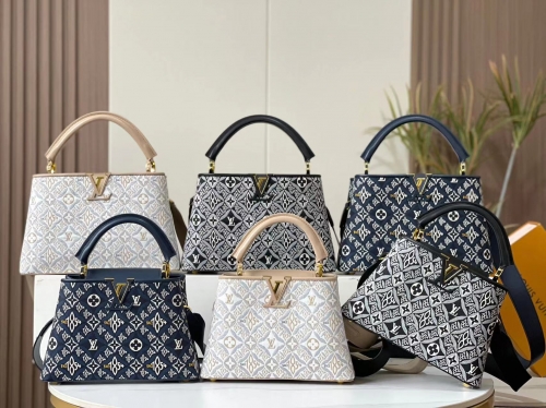 No.54991      M57357    27*18*9cm   M57358    31.5*20*11cm  CAPUCINES handbag, embroidered, cow leather