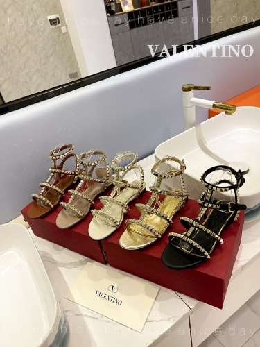 No.62857  Valentino  size 35-42  Wrapped ankle sandals with rivets