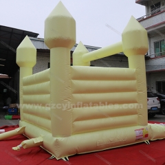 Yellow inflatable wedding bounce house