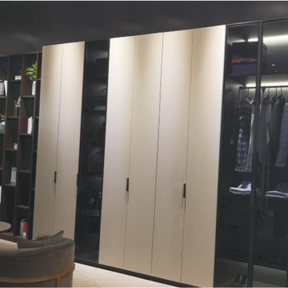 Minimalist built-in wardrobe featuring scratch-resistant matte UV wood finish panels