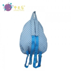 Plush backpack with doll