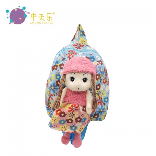 Plush backpack with doll