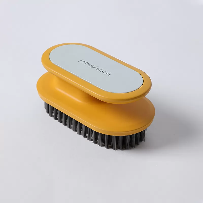 Yellow laundry brush