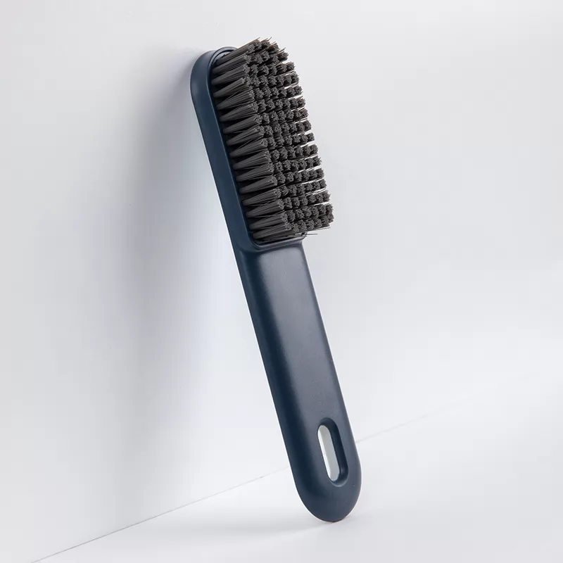 Blue shoe brush