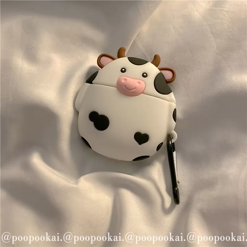 White standing cow airpods1 / 2