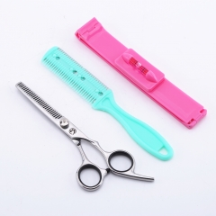 Tooth scissors + artifact + haircomb