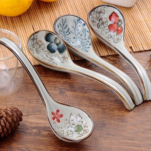 Four small ceramic spoons for household use