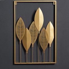 Golden frame and green leaves