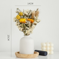 White bottle + yellow wax Chrysanthemum