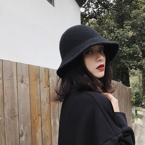 You can wear black wool fisherman's hat in all seasons