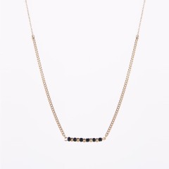 Black and gold bead bar necklace in gold plating steel