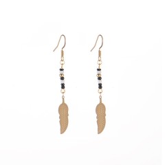 Black white and gold bead bar with feather drop earrings