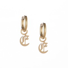 Gold plated gothic initial E huggie earrings in stainless steel