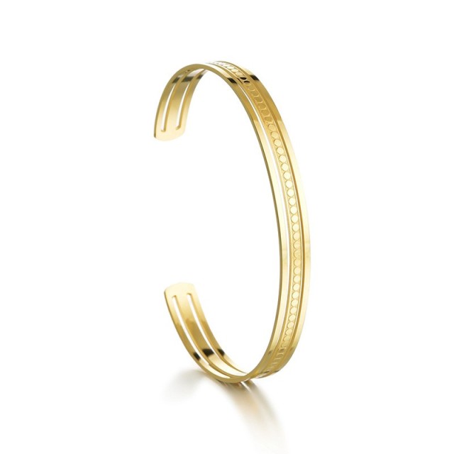 Polka linear cuff bracelet in gold plated stainless steel