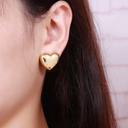Diamont inlayed heart stud earrings in gold plated stainless steel