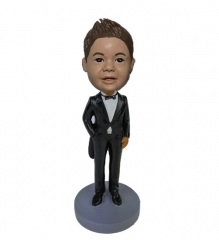 Bobblehead doll boy in suit