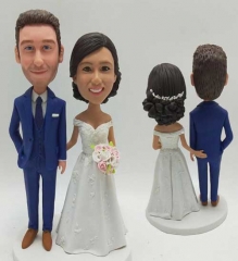 Custom bride and groom bobbleheads grabbing butts