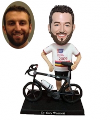 Custom bobblehead riding bicycle