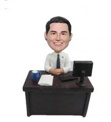 Custom Computer bobbleheads at office desk