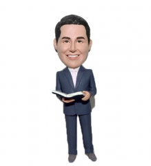 Custom pastor bobblehead with book