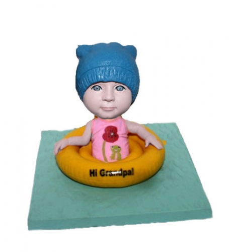 Swimming baby bobblehead doll