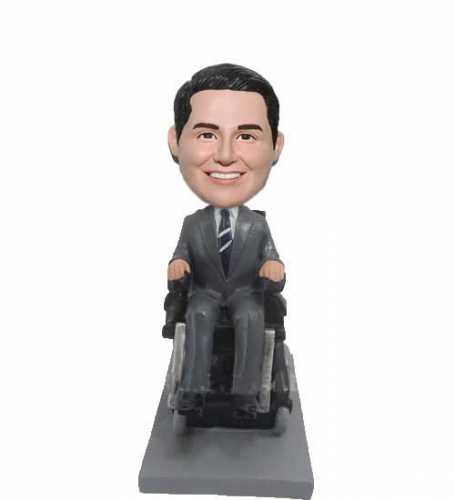 Bobbleheads in wheelchair